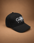 Black GOD F1RST six-panel baseball cap with white Trinity knot embroidery