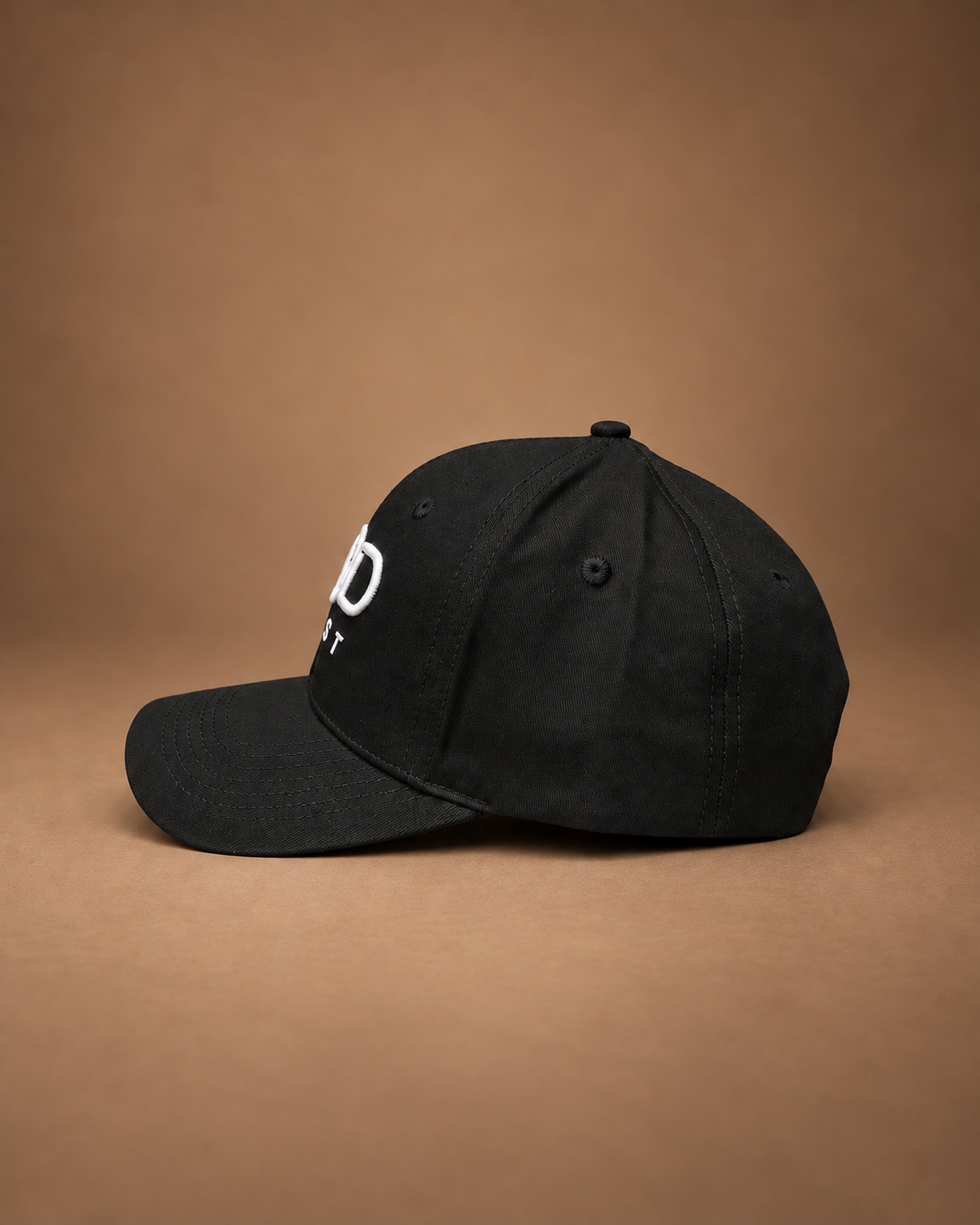 GOD F1RST baseball cap showing embroidered ventilation eyelets
